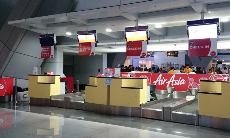 packing tips summer trip-AirAsia counter Manila airport